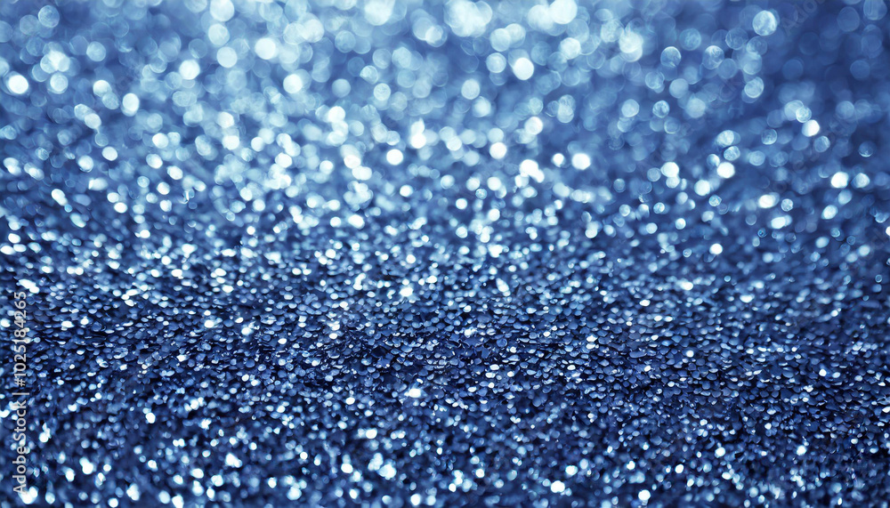Shimmering blue glitter creates a captivating texture in a dimly lit environment, showcasing intricate details and sparkling reflections Shimmering blue glitter creates a captivating texture in a dimly lit environment, showcasing intricate details and sparkling reflections