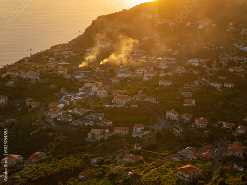 View of Estreito Da Calheta municipality at sunset photo