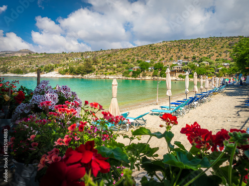 Obraz na płótnie Landscape with sun umbrella and lounge chair on Aliki beach at Thassos islands, Greece w salonie