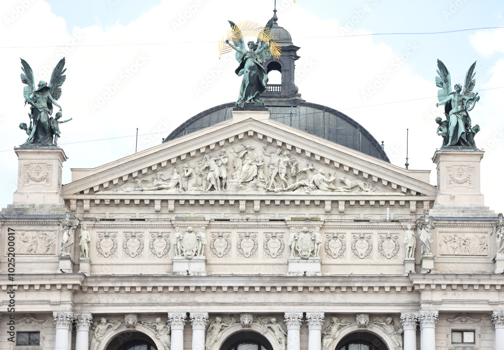Fototapeta premium Lviv, Ukraine - 02.15.2022: the upper part of the building of the large architectural ensemble of the opera house in the city of Lviv. The center of the Ukrainian city of Lviv