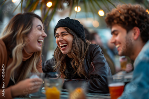 Friends laughing together sharing a funny moment