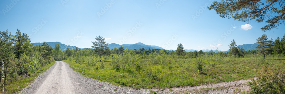 bike and hike route through riparian zone Isar river, from Bad Tolz to Lenggries with mountain view bike and hike route through riparian zone Isar river, from Bad Tolz to Lenggries with mountain view