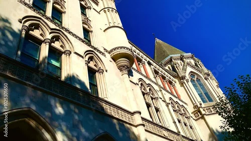 The Royal Courts of Justice Courthouse at Strand main street, Gothic style building facade, central London ENGLAND UK