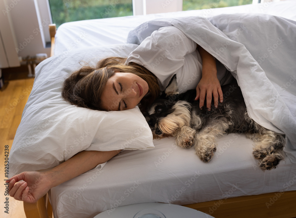 Girl sleeping with dog in bed Girl sleeping with dog in bed