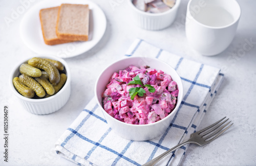 Beet hirring mayonnaise salad vinaigrette in a bowl photo