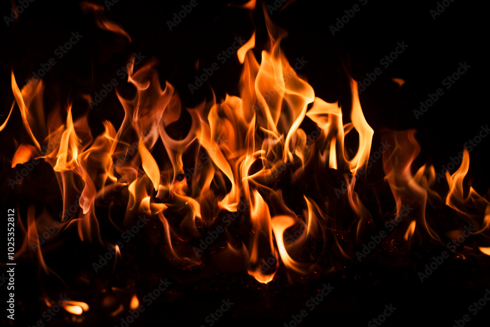 Blaze fire flame texture background. Fire sparks background. Abstract fire flame texture for banner background. Flaming burning effect. Abstract art pattern with copy space. Blaze fire flame texture background. Fire sparks background. Abstract fire flame texture for banner background. Flaming burning effect. Abstract art pattern with copy space.