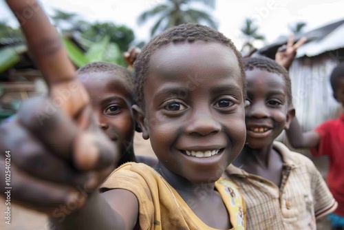 Unidentified Ghanaian little girl smiles. Children of Ghana suffer of poverty due to the economic situation