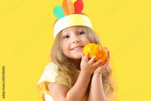 Cute little girl with pumpk...
