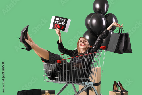 Young woman with card in sh...
