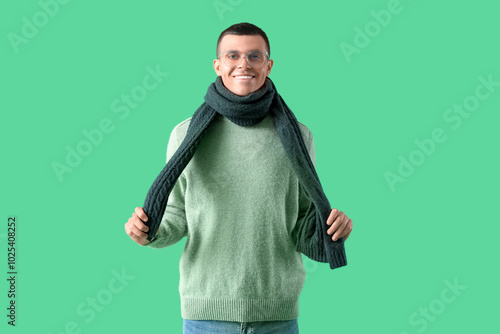 Young man in winter clothes...