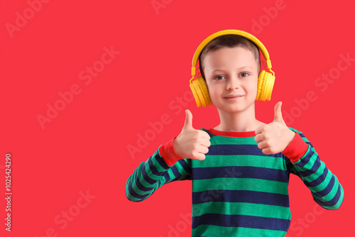Cute little boy in headphon...