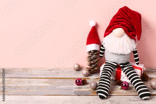 Christmas gnome with gift b...