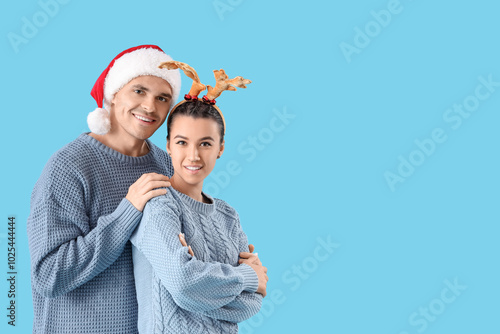 Happy young couple in chris...