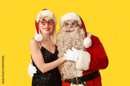 Santa Claus and beautiful m...