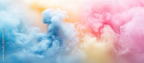 Abstract colorful smoke background with pastel pink, blue, and yellow colors.