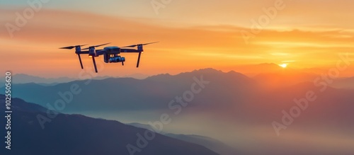 Drone flying over mountain range at sunset.