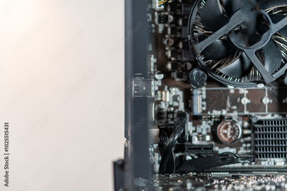 Close-up of Computer Motherboard and Cooling Fan Close-up of Computer Motherboard and Cooling Fan