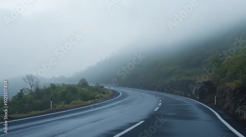 Highway in misty hills