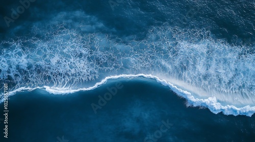 Fototapeta Naklejka Na Ścianę i Meble -  Aerial View of a Blue Ocean Wave Crashing
