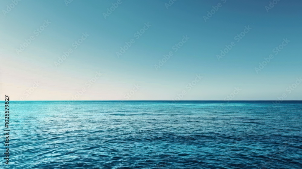 Fototapeta premium Tranquil Blue Ocean with Clear Sky