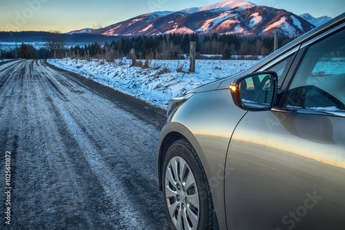 Car on the country road during winter.