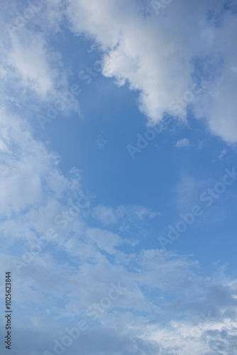  Blue sky and puffy clouds 