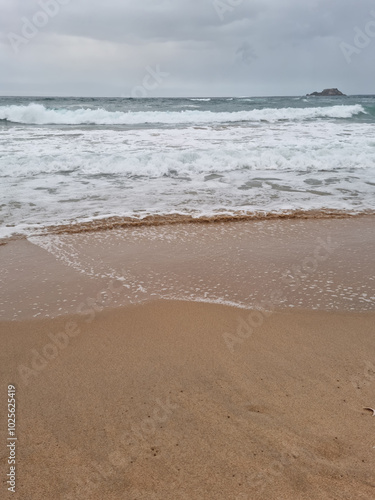  It is Sampo Beach under a cloudy sky.