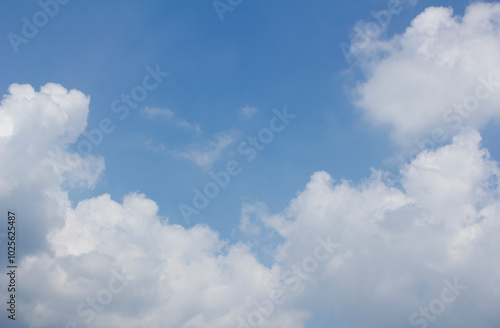  Blue sky and white puffy clouds