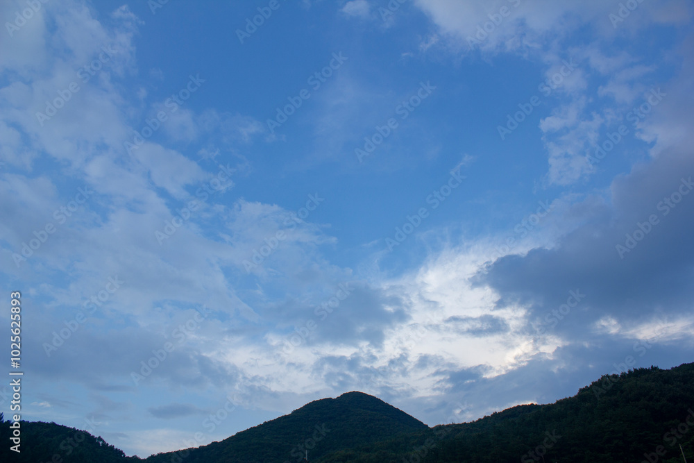 Blue sky and mountain silhouette
Blue sky and mountain silhouette
