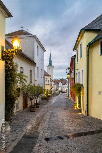 Kirchengasse mit Rathaus im Hintergrund im berühmten Weinort Gumpoldskirchen in Niederösterreich photo