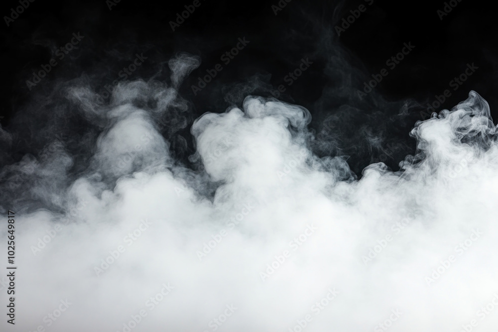 Fototapeta premium Smoke swirling on black background, creating mesmerizing patterns.