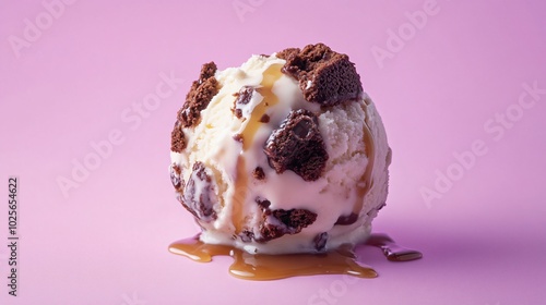 Frozen cottage cheese ice cream with brownie chunks, isolated on a pastel purple background with a small drizzle of caramel