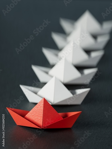 Different business concept.new ideas. paper art style. creative idea.Leadership concept using red paper ship among white boats.3D rendering on black background. 