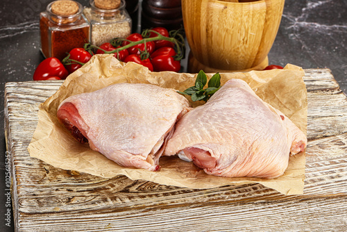 Raw chicken thigh for cooking photo