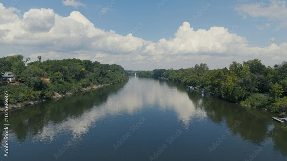 Aerial-Flying over Cumberland River-White clouds-Freeway bridge in the far distance Aerial-Flying over Cumberland River-White clouds-Freeway bridge in the far distance