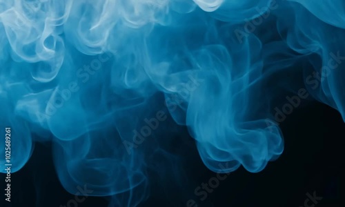 Abstract Blue Smoke Swirls on Black Background