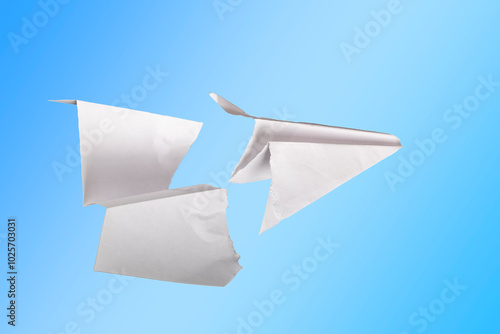 paper plane in the middle it is torn. concept of breakdown, accident, crash, does not work. close-up.