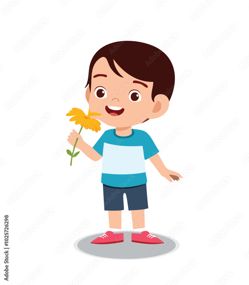 Fototapeta premium Little boy smelling a flower showing a Smell