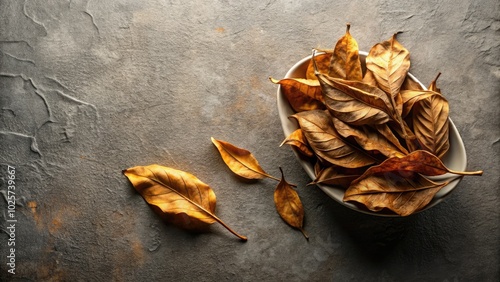 In natural light, dried largeleaf tea leaves form a peaceful still life, showcasing their minimalist beauty and inviting a sense of calm and tranquility. photo