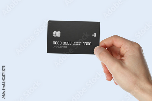 Hand showing credit card, or card, or business card or voucher, isolated on white background, template, mock-up