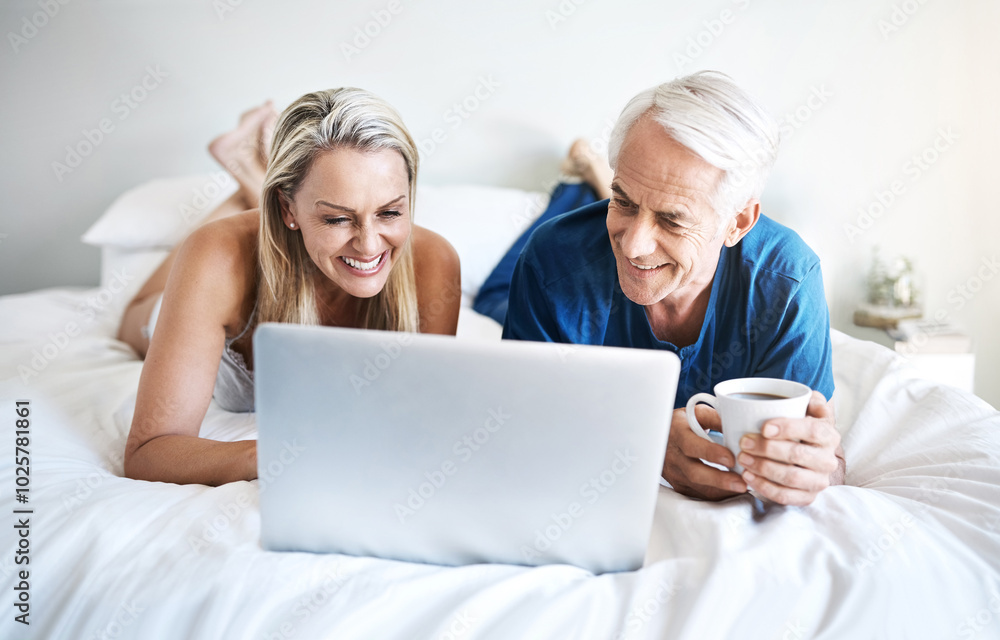 Happy couple, love or laptop in bed for movie choice and streaming option online on sofa in home. Relax, mature and people in bedroom to chill on social media app on digital website or technology Happy couple, love or laptop in bed for movie choice and streaming option online on sofa in home. Relax, mature and people in bedroom to chill on social media app on digital website or technology