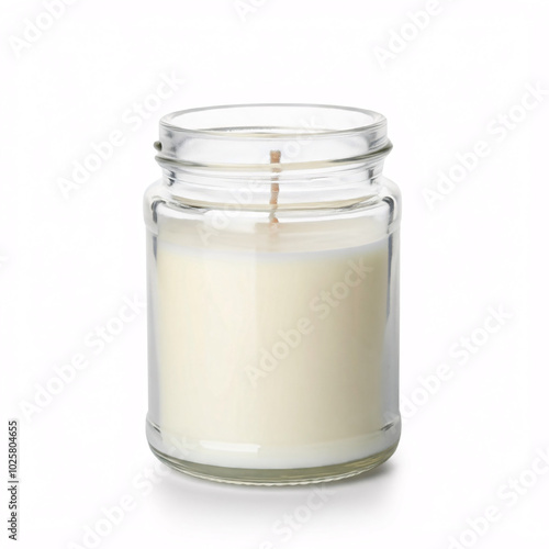 white candle in clear glass jar on white background