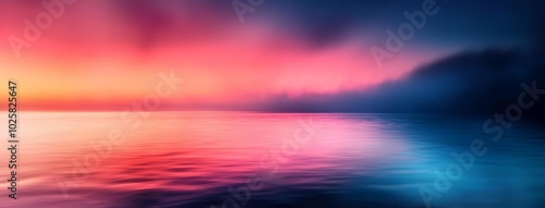  A crisp image of a tranquil body of water, reflected pink, orange, and blue hues from the sun-kissed sky