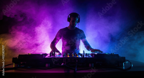 Vibrant nightclub dj in action with colorful stage lights