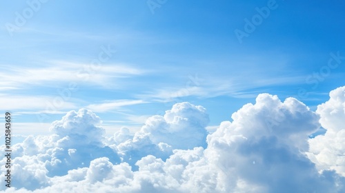 White Cumulus Clouds Against a Bright Blue Sky