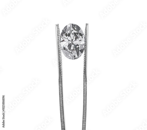 Cut Beautiful diamond held by tweezers, transparent background photo