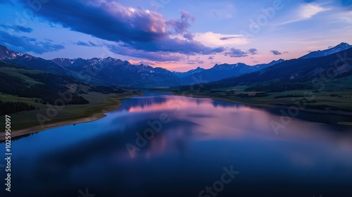 Serene Aerial View of Calm Lake Surrounded by Mountains