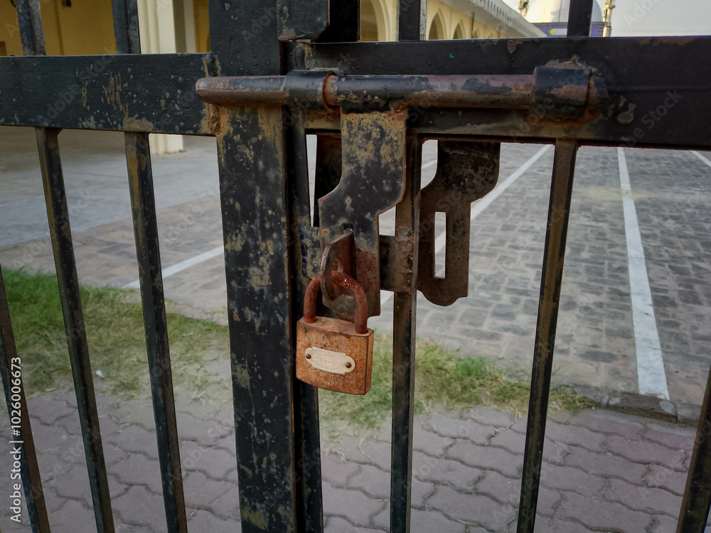 Old Rusty Lock on iron Made Gate Old Rusty Lock on iron Made Gate