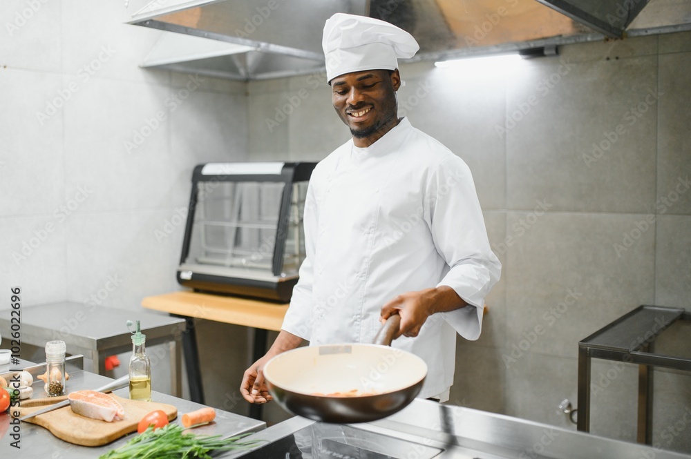 handsome african american chef at restaurant kitchen handsome african american chef at restaurant kitchen