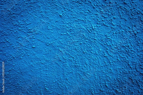 Discover a stunning blue textured concrete background, perfect for design projects, wall art, and diverse creative applications. Enhance your artistic vision with this unique texture.